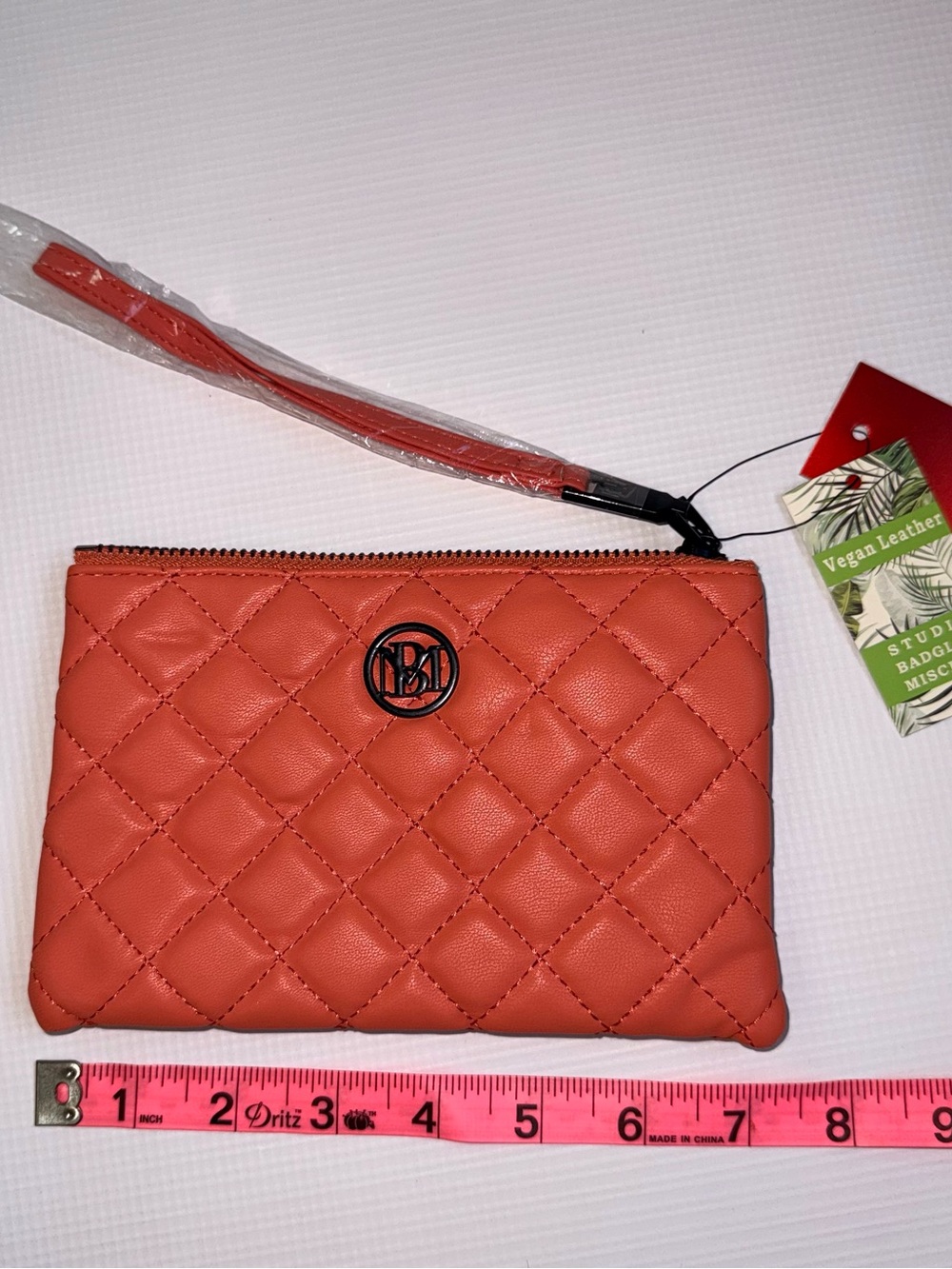 Badgley Mischka Quilted Coral Wristlet Clutch